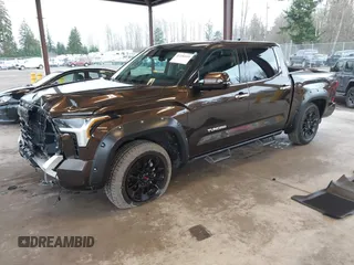 2023 Toyota Tundra Limited with VIN 5TFJA5DB9PX125400, listed as a IAAI auction lot 41336129 with 12,384 mi miles and . Bid and sale history available at DreamBid. Image 18.