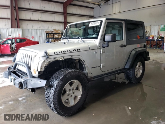 2007 Jeep Wrangler Rubicon z VIN 1J8GA64117L187431, wystawiony jako Copart lot #61293624 z przebiegiem 263 459 mil mil oraz Szkoda całkowita • Salvage title. Historia ofert i sprzedaży dostępna na DreamBid. Obrazek 1.