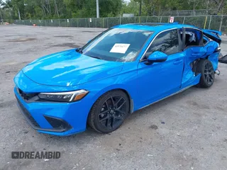 2023 Honda Civic Sport Touring z VIN 19XFL1H84PE002868, wystawiony jako IAAI lot #41978174 z przebiegiem 42 604 mil mil oraz . Historia ofert i sprzedaży dostępna na DreamBid. Obrazek 2.