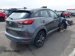 2018 Mazda CX-3 Touring z VIN JM1DKFC7XJ0312349, wystawiony jako IAAI lot #42368311 z przebiegiem 97 772 mil mil oraz . Historia ofert i sprzedaży dostępna na DreamBid. Obrazek 4.
