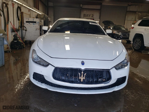 2014 Maserati Ghibli S Q4 with VIN ZAM57RTA4E1117703, listed as a Copart auction lot 48754515 with 104,284 mi miles and Salvage Title. Bid and sale history available at carsss.com. Image 5.