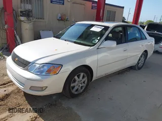 2001 Toyota Avalon XL z VIN 4T1BF28B01U142721, wystawiony jako IAAI lot #42340748 z przebiegiem 204 644 mil mil oraz . Historia ofert i sprzedaży dostępna na DreamBid. Obrazek 2.