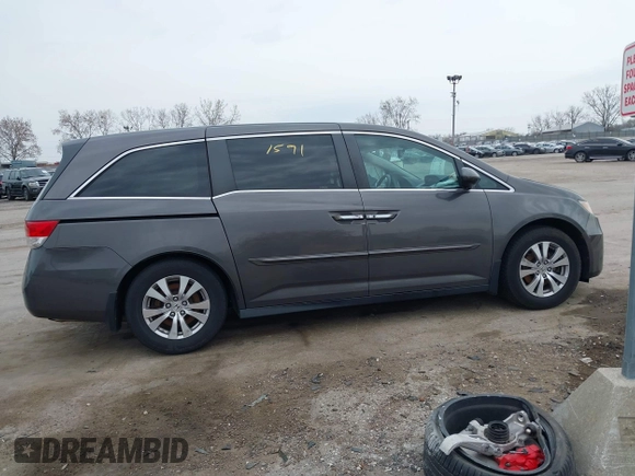 2014 Honda Odyssey EX-L with VIN 5FNRL5H62EB006346, listed as a IAAI auction lot 42061591 with 179,994 mi miles and . Bid and sale history available at DreamBid. Image 13.