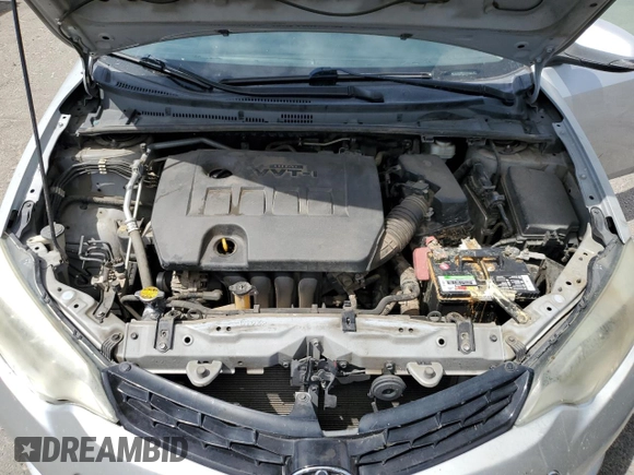 2014 Toyota Corolla L z VIN 2T1BURHE9EC029012, wystawiony jako Copart lot #63512825 z przebiegiem 214 851 mil mil oraz Szkoda całkowita • Salvage title. Historia ofert i sprzedaży dostępna na DreamBid. Obrazek 11.