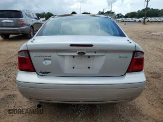 2006 Ford Focus S с VIN 1FAFP34N76W122783, выставлен на аукционе Copart как лот 60406325 с пробегом 290 434 миль миль и Списание • Salvage title. История ставок и продаж доступна на DreamBid. Изображение 6.