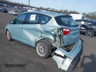 2013 Ford C-Max SE with VIN 1FADP5AU9DL506920, listed as a IAAI auction lot 42105665 with 194,064 mi miles. Bid and sale history available at carsss.com. Image 3.