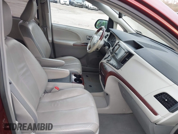 2013 Toyota Sienna XLE with VIN 5TDDK3DC1DS068215, listed as a IAAI auction lot 41610737 with 168,186 mi miles and . Bid and sale history available at DreamBid. Image 5.