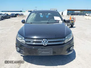 2014 Volkswagen Tiguan SEL with VIN WVGAV3AX4EW025339, listed as a IAAI auction lot 42313665 with 96,756 mi miles and . Bid and sale history available at DreamBid. Image 12.
