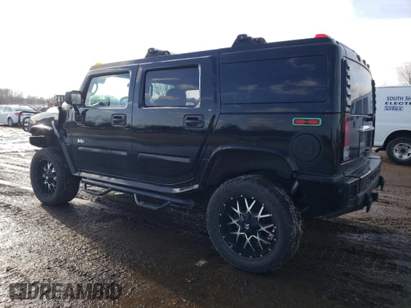 2005 Hummer H2 SUV with VIN 5GRGN23U35H111403, listed as a Copart auction lot 84720994 with 142,159 mi miles and Salvage Title. Bid and sale history available at carsss.com. Image 2.