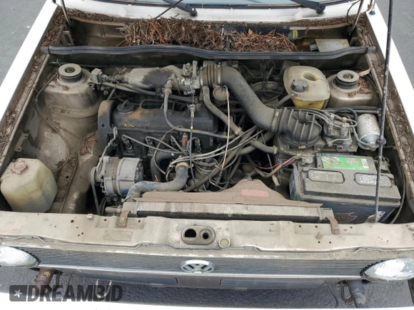 1984 Volkswagen Rabbit z VIN WVWCA0152EK015292, wystawiony jako Copart lot #55503315 z przebiegiem 216 970 mil mil oraz Tytuł czysty. Historia ofert i sprzedaży dostępna na DreamBid. Obrazek 11.