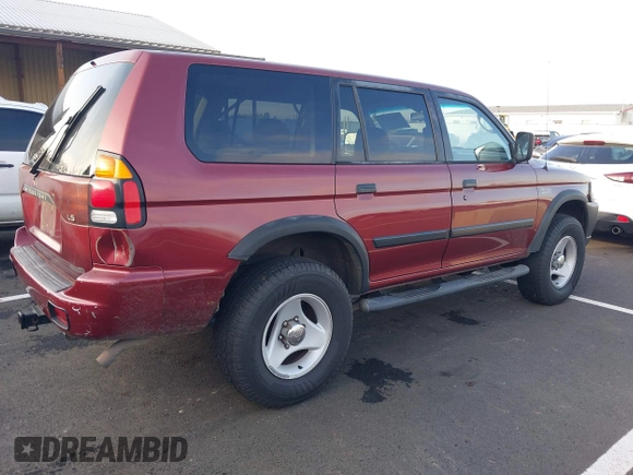 2000 Mitsubishi Montero Sport LS with VIN JA4MT31H5YP808601, listed as a IAAI auction lot 41070635 with 209,172 mi miles. Bid and sale history available at carsss.com. Image 4.