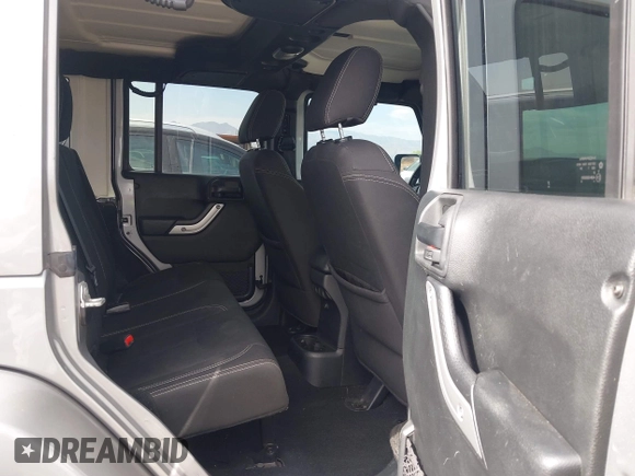 2018 Jeep Wrangler Unlimited Sahara with VIN 1C4BJWEG6JL817231, listed as a IAAI auction lot 42225248 with 68,015 mi miles and . Bid and sale history available at DreamBid. Image 8.