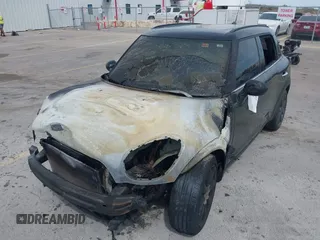 2014 MINI Countryman S with VIN WMWZC3C55EWP25697, listed as a IAAI auction lot 41797132 with Not Provided miles and . Bid and sale history available at DreamBid. Image 16.