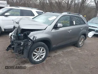 2014 Kia Sorento LX with VIN 5XYKTDA62EG470719, listed as a IAAI auction lot 41804962 with 108,838 mi miles and . Bid and sale history available at carsss.com. Image 2.