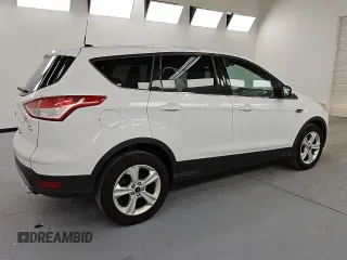 2015 Ford Escape SE with VIN 1FMCU9G90FUB09601, listed as a Copart auction lot 54174665 with 84,560 mi miles and Clean Title. Bid and sale history available at DreamBid. Image 3.