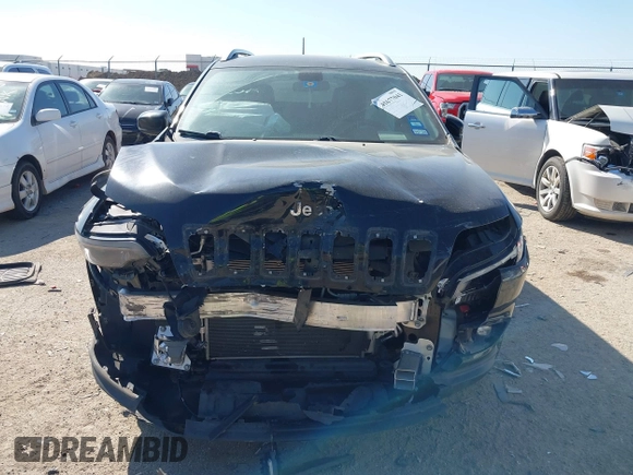 2019 Jeep Cherokee Latitude Plus with VIN 1C4PJLLB4KD312411, listed as a IAAI auction lot 41677041 with 82,802 mi miles and . Bid and sale history available at DreamBid. Image 12.