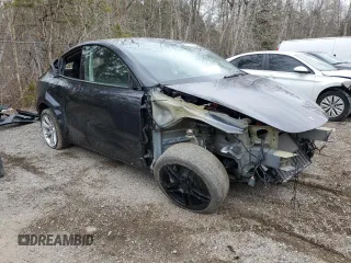2024 Tesla Model Y Long Range with VIN 7SAYGAEE6RF070354, listed as a Copart auction lot 49826975 with Not Provided miles and Clean Title. Bid and sale history available at DreamBid. Image 4.