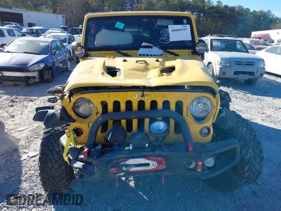 2015 Jeep Wrangler Unlimited Rubicon z VIN 1C4BJWFG4FL681946, wystawiony jako IAAI lot #40809597 z przebiegiem 57 148 mil mil oraz . Historia ofert i sprzedaży dostępna na DreamBid. Obrazek 6.