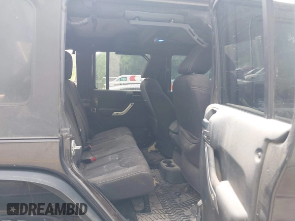 2013 Jeep Wrangler Unlimited Rubicon with VIN 1C4BJWFG5DL652050, listed as a IAAI auction lot 42451954 with 107,110 mi miles and . Bid and sale history available at DreamBid. Image 8.