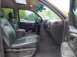 2005 GMC Envoy XL SLE with VIN 1GKET16S156114805, listed as a IAAI auction lot 42163519 with 168,584 mi miles. Bid and sale history available at carsss.com. Image 5.
