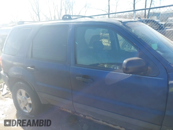 2003 Ford Escape XLT Popular with VIN 1FMYU03103KD07779, listed as a IAAI auction lot 42019919 with 245,522 mi miles. Bid and sale history available at carsss.com. Image 13.