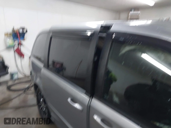 2015 Dodge Grand Caravan SE with VIN 2C4RDGBG9FR703691, listed as a IAAI auction lot 41395564 with 170,735 mi miles and . Bid and sale history available at DreamBid. Image 19.