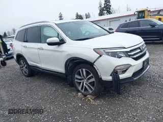 2017 Honda Pilot Elite with VIN 5FNYF6H06HB096156, listed as a IAAI auction lot 41771161 with 73,889 mi miles and . Bid and sale history available at DreamBid. Image 1.