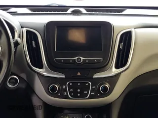 2020 Chevrolet Equinox LT z VIN 2GNAXJEV0L6231512, wystawiony jako IAAI lot #42516878 z przebiegiem 67 453 mil mil oraz . Historia ofert i sprzedaży dostępna na DreamBid. Obrazek 7.
