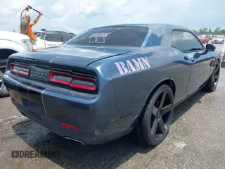 2016 Dodge Challenger SXT with VIN 2C3CDZAG4GH245251, listed as a IAAI auction lot 42650173 with 133,670 mi miles and . Bid and sale history available at DreamBid. Image 4.