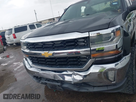 2016 Chevrolet Silverado 1500 LT with VIN 1GCVKREH3GZ233606, listed as a IAAI auction lot 42111728 with 90,449 mi miles and . Bid and sale history available at DreamBid. Image 12.