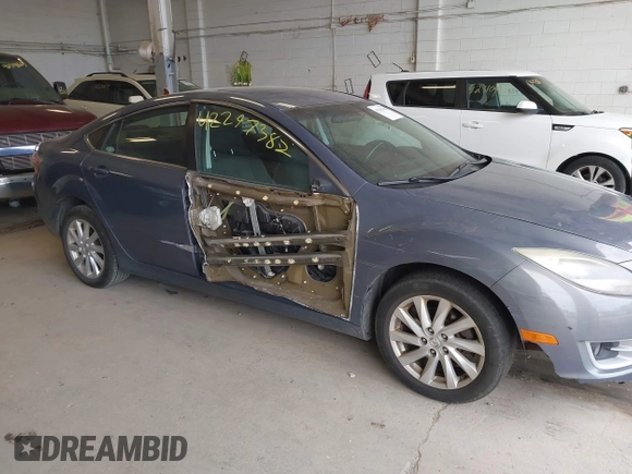 2011 Mazda 6 i Touring with VIN 1YVHZ8CH8B5M30433, listed as a IAAI auction lot 42297382 with 261,637 mi miles and . Bid and sale history available at DreamBid. Image 6.