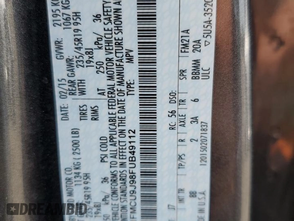 2015 Ford Escape Titanium with VIN 1FMCU9J98FUB49112, listed as a Copart auction lot 58989915 with 94,060 mi miles and Salvage title. Bid and sale history available at DreamBid. Image 12.