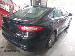 2013 Ford Fusion Titanium Hybrid with VIN 3FA6P0RU4DR281789, listed as a IAAI auction lot 41909115 with 161,008 mi miles and . Bid and sale history available at DreamBid. Image 4.