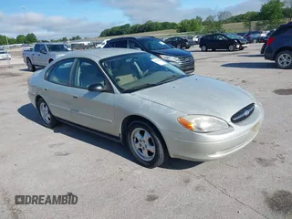 2005 Ford Taurus SE z VIN 1FAFP532X5A165061, wystawiony jako IAAI lot #42602804 z przebiegiem 191 890 mil mil oraz . Historia ofert i sprzedaży dostępna na DreamBid. Obrazek 1.