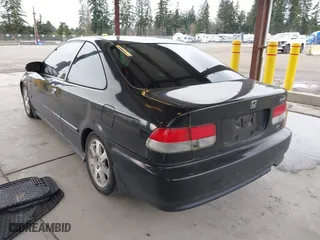 2000 Honda Civic EX with VIN 1HGEJ814XYL131063, listed as a IAAI auction lot 41809462 with 187,270 mi miles. Bid and sale history available at carsss.com. Image 3.