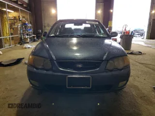 2003 Kia Spectra GS z VIN KNAFB161135104592, wystawiony jako Copart lot #52097205 z przebiegiem 119 206 mil mil oraz Szkoda całkowita • Salvage title. Historia ofert i sprzedaży dostępna na DreamBid. Obrazek 5.