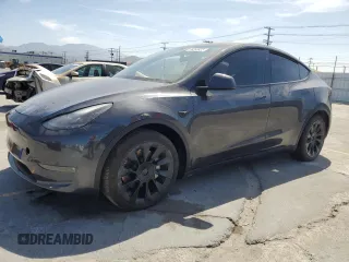 2024 Tesla Model Y Long Range z VIN 7SAYGDEEXRA237667, wystawiony jako Copart lot #58260635 z przebiegiem Nie podano mil oraz Szkoda całkowita • Salvage title. Historia ofert i sprzedaży dostępna na DreamBid. Obrazek 1.