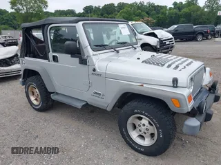 2003 Jeep Wrangler Sport with VIN 1J4FA49S73P326743, listed as a IAAI auction lot 42588073 with 121,814 mi miles and . Bid and sale history available at DreamBid. Image 1.