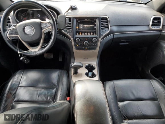 2014 Jeep Grand Cherokee Limited z VIN 1C4RJFBG5EC446829, wystawiony jako Copart lot #51072865 z przebiegiem 114 590 mil mil oraz Szkoda całkowita • Salvage title. Historia ofert i sprzedaży dostępna na DreamBid. Obrazek 8.