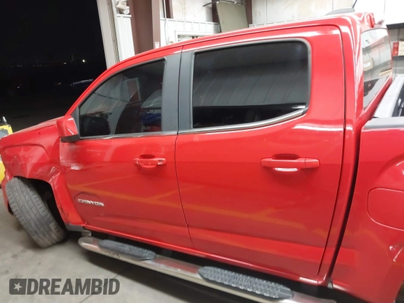 2019 GMC Canyon 2WD SLE z VIN 1GTG5CENXK1137028, wystawiony jako IAAI lot #42374821 z przebiegiem 91 228 mil mil oraz . Historia ofert i sprzedaży dostępna na DreamBid. Obrazek 14.