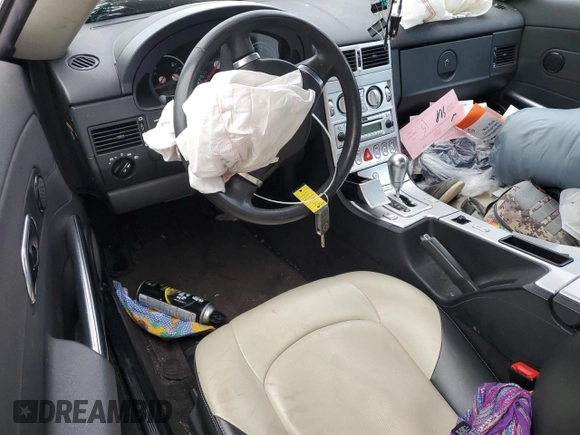 2005 Chrysler Crossfire with VIN 1C3AN55L45X059075, listed as a Copart auction lot 83189904 with 55,570 mi miles and Salvage Title. Bid and sale history available at DreamBid. Image 8.