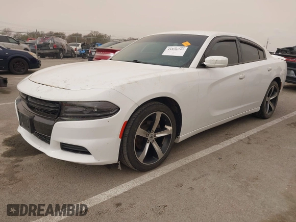 2017 Dodge Charger SE with VIN 2C3CDXBG1HH581654, listed as a IAAI auction lot 41836747 with 124,037 mi miles and . Bid and sale history available at carsss.com. Image 2.
