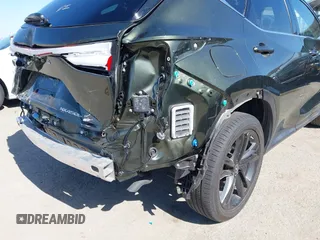 2023 Lexus NX 450h+ Luxury with VIN JTJHKCFZ0P2017929, listed as a IAAI auction lot 42282635 with 18,611 mi miles and . Bid and sale history available at DreamBid. Image 19.