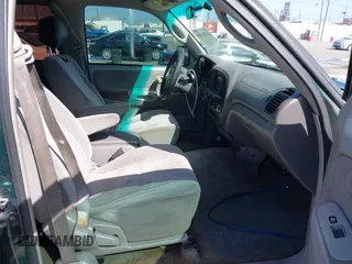 2000 Toyota Tundra SR5 with VIN 5TBRT3417YS122889, listed as a IAAI auction lot 41711107 with 288,475 mi miles and . Bid and sale history available at DreamBid. Image 5.