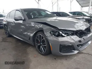 2021 BMW 5 Series 530e with VIN WBA13AG05MCF48300, listed as a IAAI auction lot 41735999 with 31,096 mi miles and . Bid and sale history available at carsss.com. Image 1.