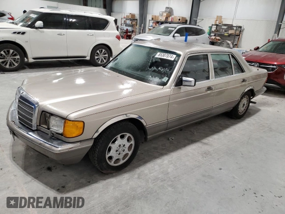 1990 Mercedes-Benz 560 with VIN WDBCA39E7LA517710, listed as a Copart auction lot 85307074 with 225,233 mi miles and Salvage Title. Bid and sale history available at DreamBid. Image 1.