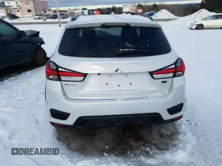 2022 Mitsubishi Outlander Sport SE z VIN JA4AJVAW4NU606364, wystawiony jako Copart lot #71966612 z przebiegiem 1 063 mil mil oraz . Historia ofert i sprzedaży dostępna na DreamBid. Obrazek 6.