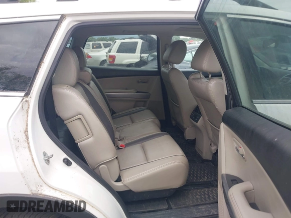 2012 Mazda CX-9 Grand Touring with VIN JM3TB3DA1C0356335, listed as a IAAI auction lot 42658284 with 141,537 mi miles and . Bid and sale history available at DreamBid. Image 8.