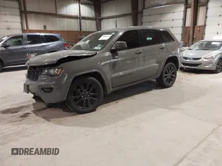 2019 Jeep Grand Cherokee Laredo E with VIN 1C4RJFAG9KC667394, listed as a IAAI auction lot 41316264 with 55,156 mi miles. Bid and sale history available at carsss.com. Image 17.
