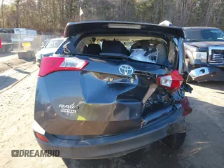 2014 Toyota RAV4 LE with VIN JTMBFREV9E5030687, listed as a IAAI auction lot 41095249 with 53,726 mi miles and . Bid and sale history available at DreamBid. Image 16.